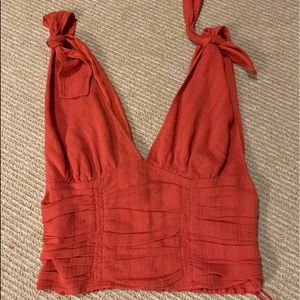 Shoulder-tie blouse with plunging neckline